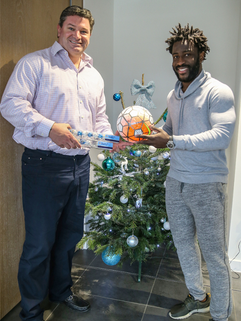 Wilfried-Bony-scores-for-Manchester-City-and-ICP-Networks-with-CITC-Christmas-Tree-charity-prize